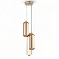 Modern geometric pendant light fixture in gold finish with adjustable height
