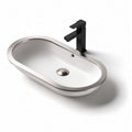 Oval ceramic sink with stainless steel rim and modern black faucet 100 x 50 x 20cm